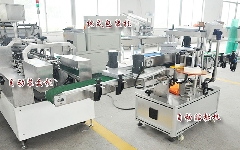 Box packing machine for filter media 