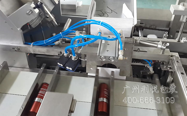 化妆品装盒机说明书放置机构 化妆品装盒机说明书放置机构